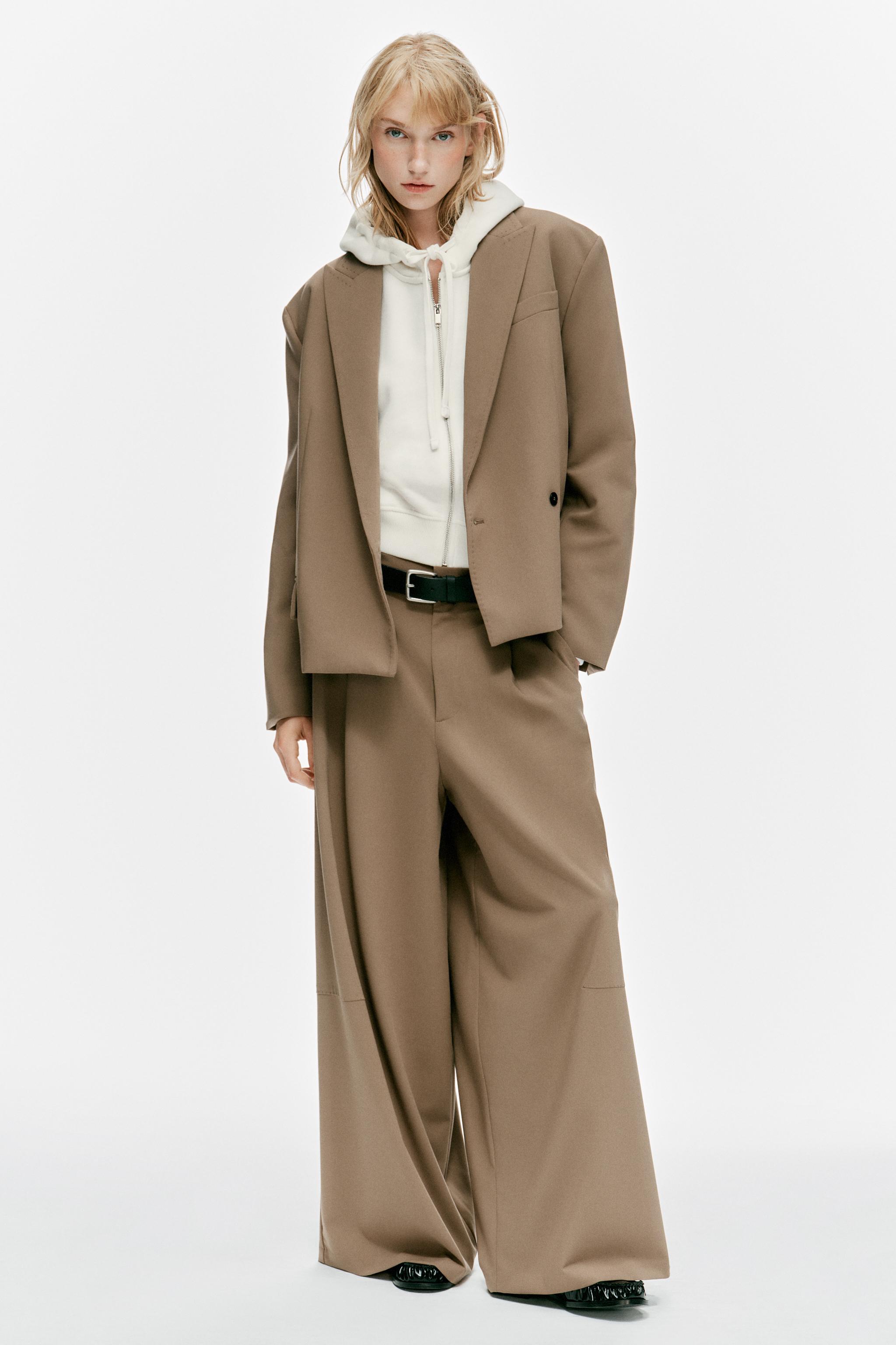 Брюки со складками и декоративной строчкой — ZARA