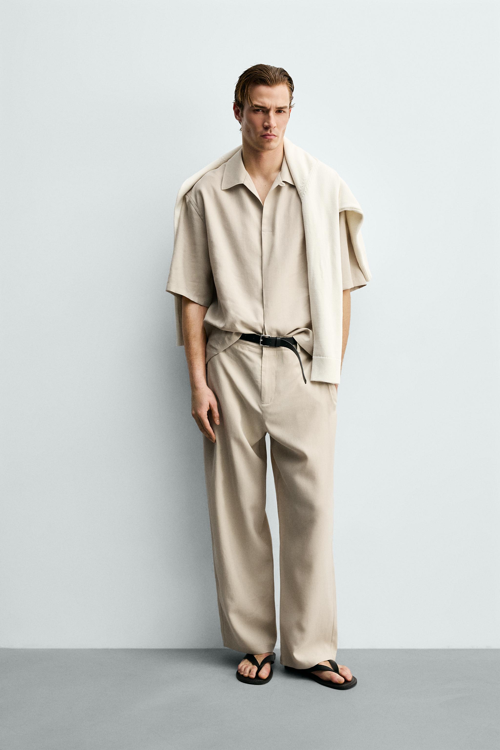 Брюки струящегося кроя с боковыми складками — ZARA