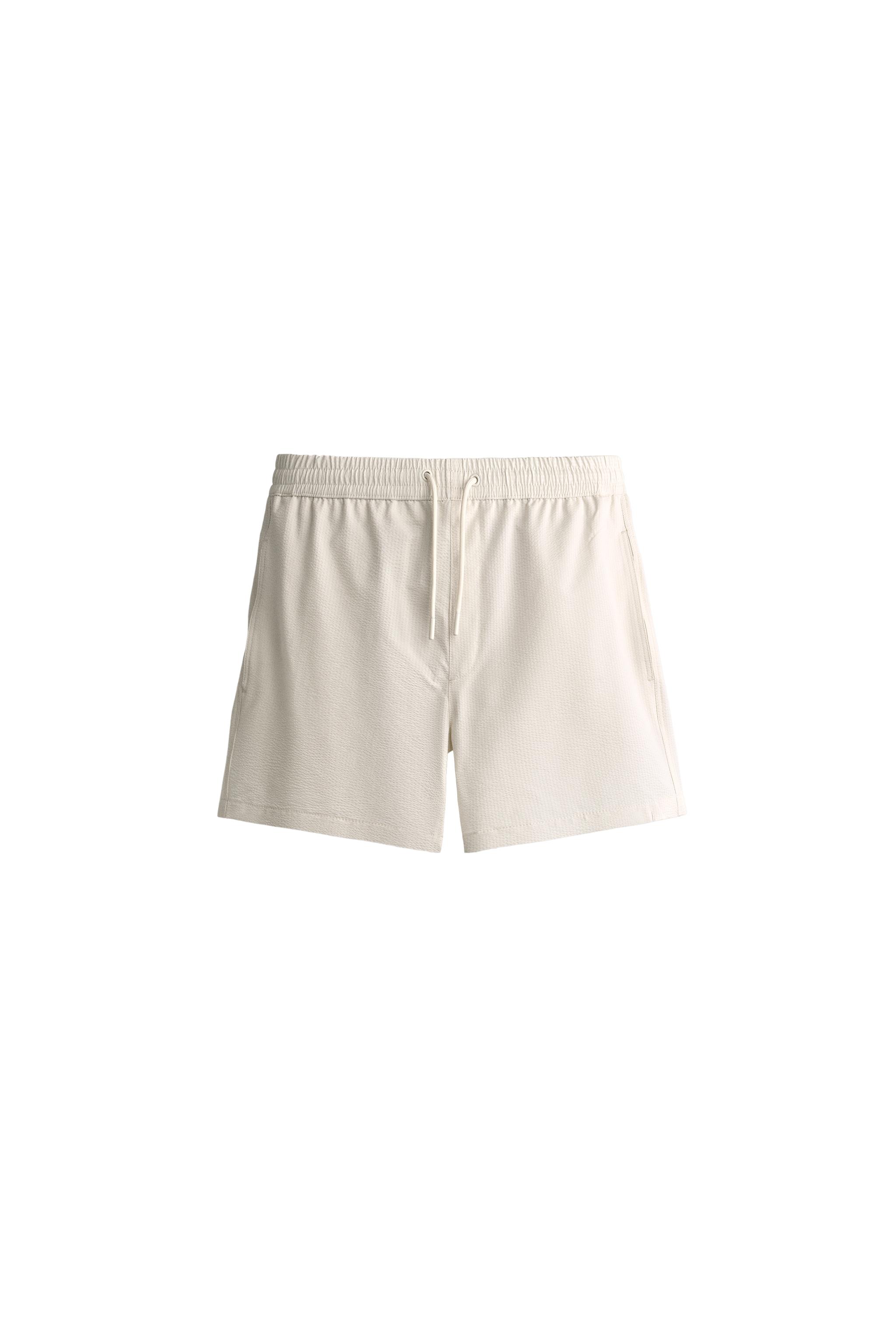ПЛАВКИ СРЕДНЕЙ ДЛИНЫ ИЗ ТКАНИ СЕЕРСАКЕР — ZARA